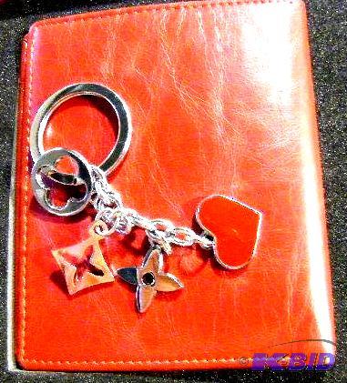 lot 190 image: Red Like Leather Wallet with Matching Key Cha...