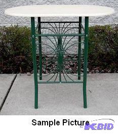 lot 24 image: Green Bistro Table - A sleek design with grac...