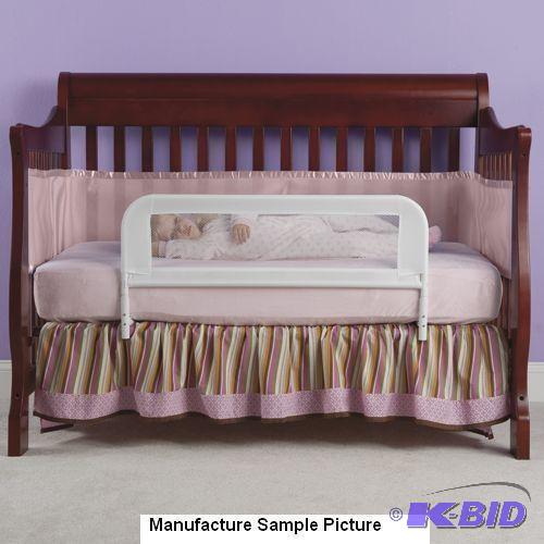 lot 93 image: One Step Ahead White Hideaway Bed Rail - A st...