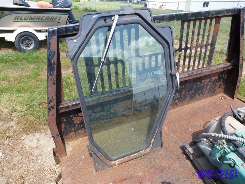 lot 15 image: Skid steer door Fits New Holland 180 skid st...