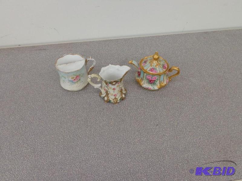 Tea Pot, Creamer and a Sugar Bowl Small Tea P...
