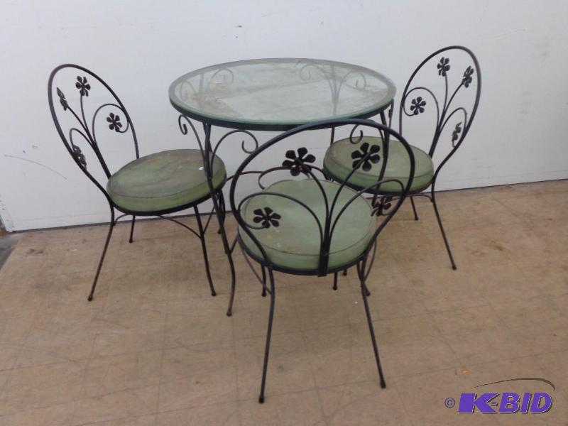 Rod Iron Table With Glass Top and 3 Chairs Ov...