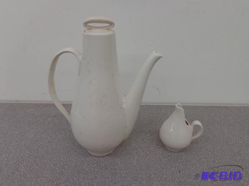 White Porcelain Pitcher and CreamMilk Pourer...