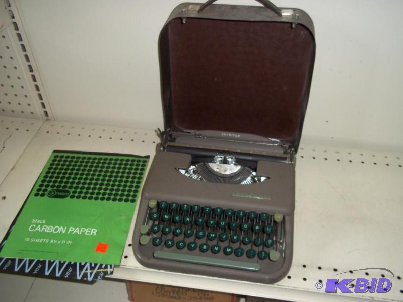 lot 119 image: Antique typewriter in portable case...
