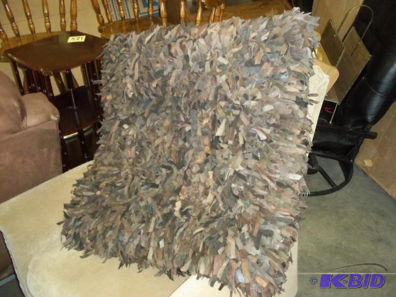 lot 131 image: Leather Tie Pillow...