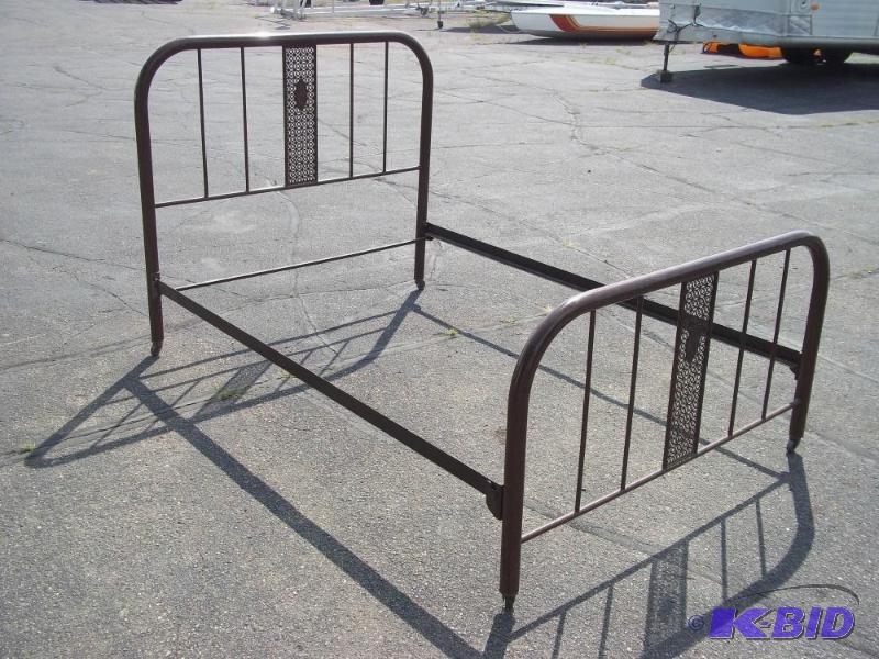 lot 133 image: Antique iron bed from the 1930s...