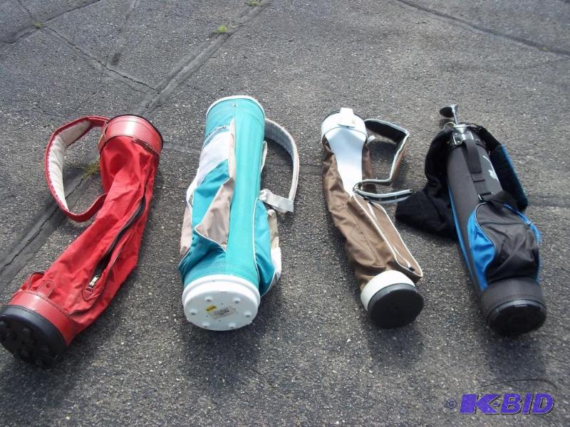 lot 21 image: Lot of 4 Golf Bags with 5 Clubs...
