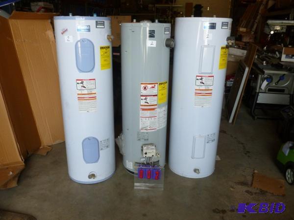 3 used water heaters as shown. 2 electric and...
