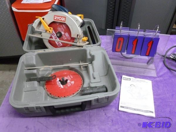 lot 11 image: Ryobi 7.25 circular saw with laser guide. Has...