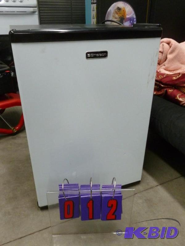 lot 12 image: Emerson compactdorm refrigerator. Clean unit...