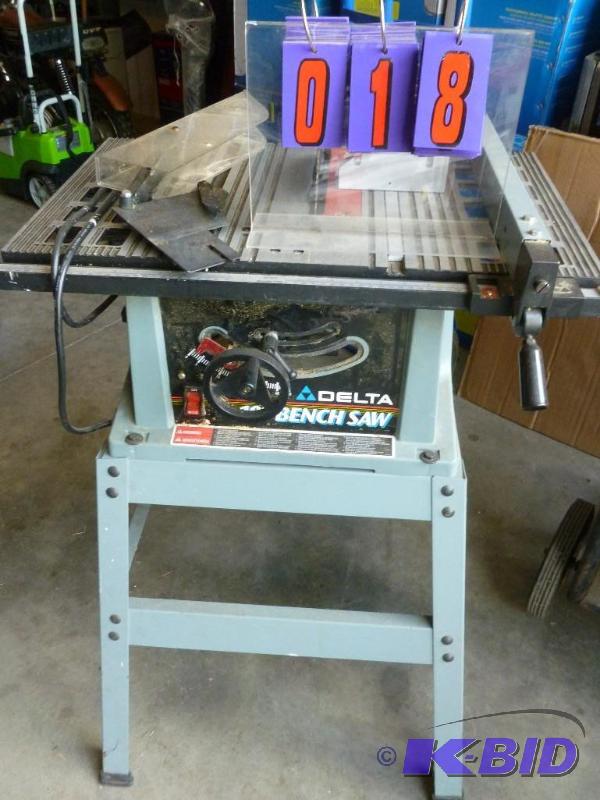 lot 18 image: Delta 10" table saw. Used condition, Com...