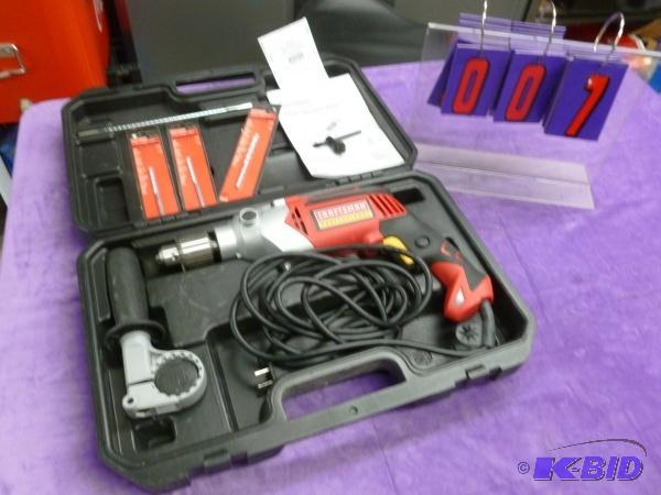 lot 7 image: Craftsman 12" vsr hammer drill. Model #...