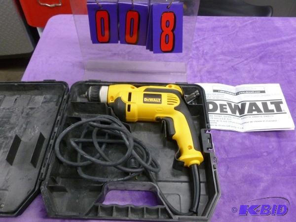 lot 8 image: Dewalt 38" vsr drill. Used condition. T...