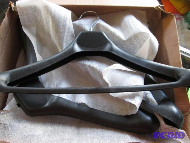Lot of 8 new heavy suit or coat hangers...