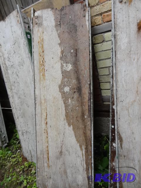 lot 192 image: 19 x 60 aluminum plank. Wood top...