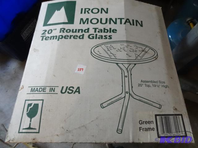 lot 227 image: Iron mountain 20" round table . Tempered...