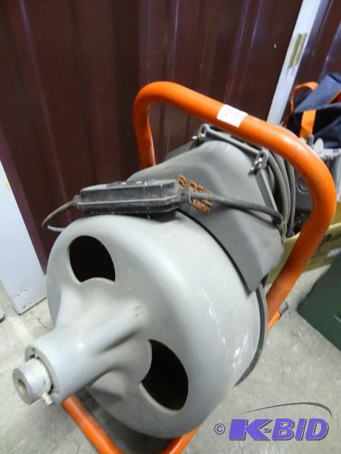 lot 54 image: Ridgid sewer snake. Missing snake. Foot switc...
