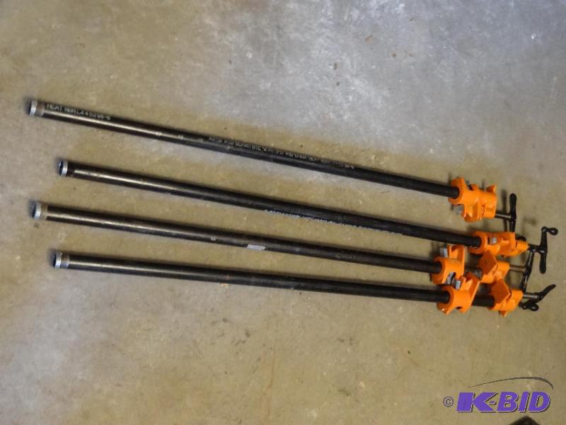 lot 90 image: 4-36" Pipe Clamps...