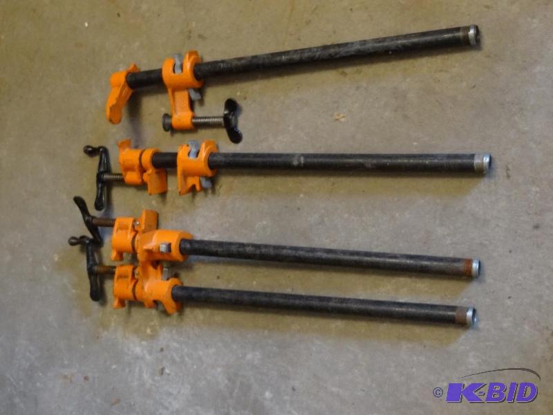 lot 95 image: 4-20" Pipe Clamps...