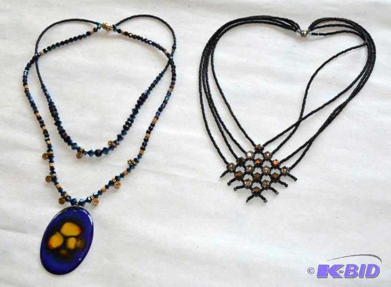 lot 12 image: 2 Necklaces one with lg blue ceramic feeling ...
