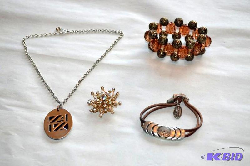 lot 15 image: Lot of costume jewelry 2 bracelets one pinkis...