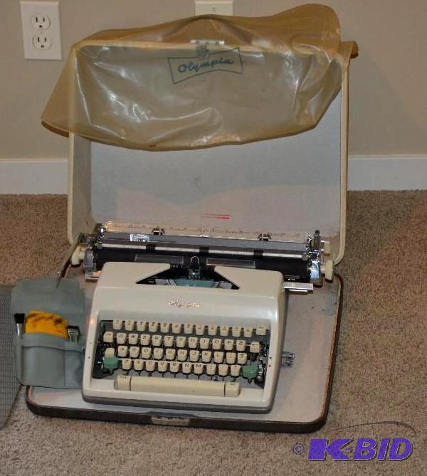 lot 40 image: Collectible Olympia Deluxe typewriter with or...