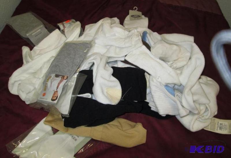 lot 212 image: Assortment of men socks and sizes- some dress...