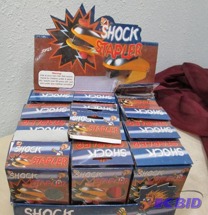 lot 81 image: Qty 12 Shock Stapler different colors...