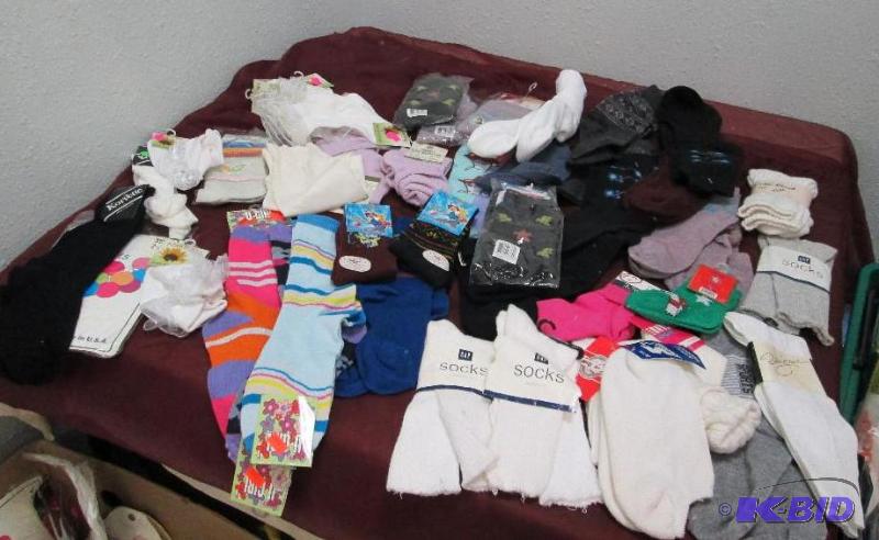 lot 93 image: Qty 46 assortment of socks, colors and sizes...