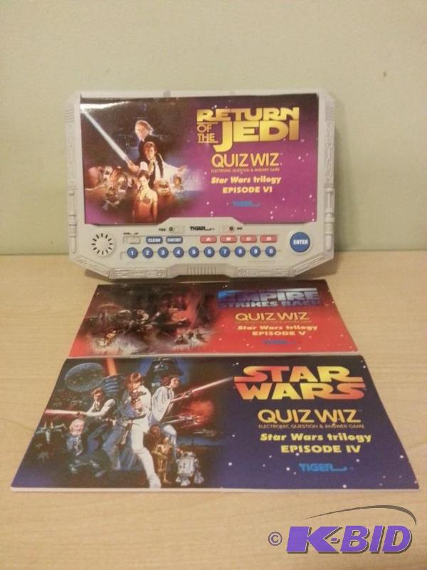 lot 105 image: Star Wars Quiz Wiz by Tiger, comes with contr...
