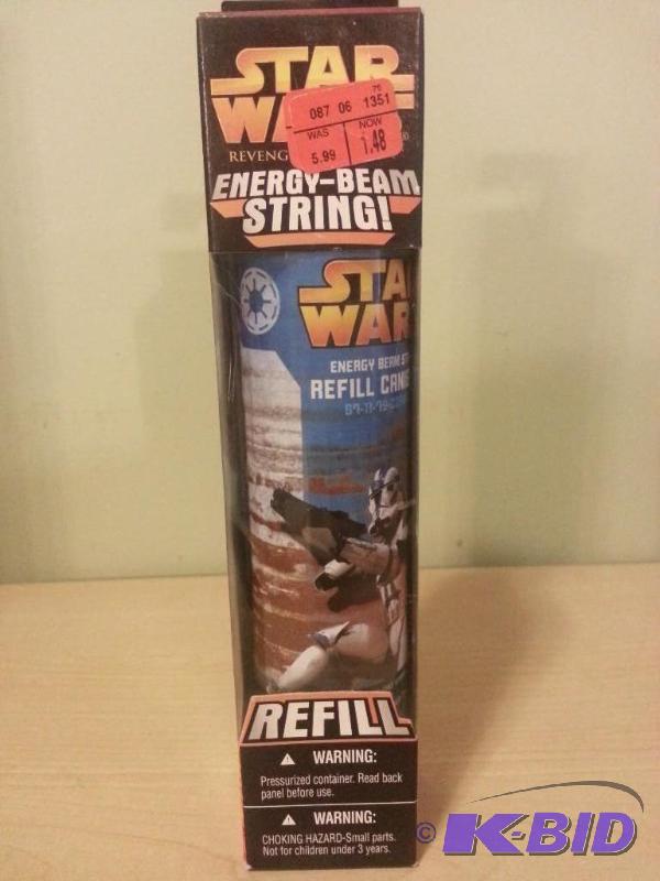 lot 12 image: Star Wars Energy-Beam String Refill Canister...