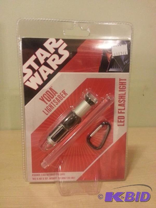 lot 135 image: Star Wars Yoda Lightsaber LED Flashlight. Nev...