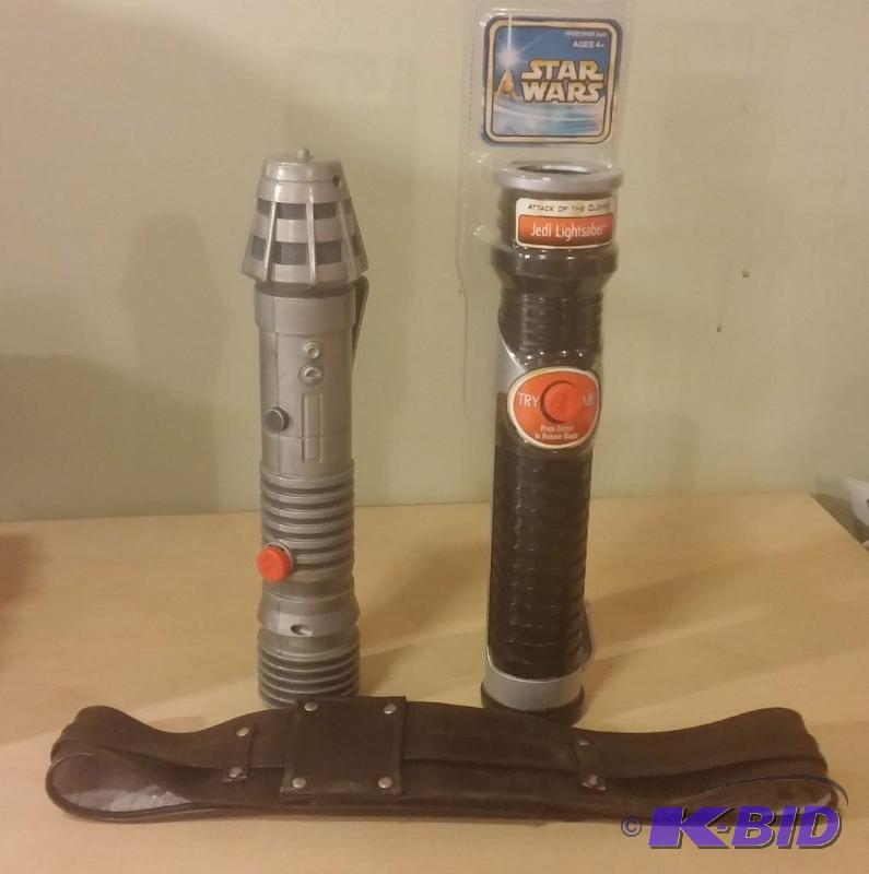 lot 191 image: Lot of 3 Items. 2 Jedi Light sabers 1 has bee...