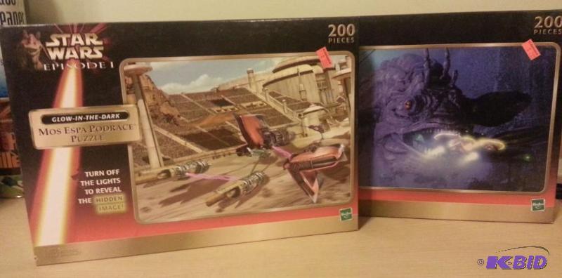 lot 32 image: Lot of 2 Star Wars Glow in the Dark Puzzles. ...