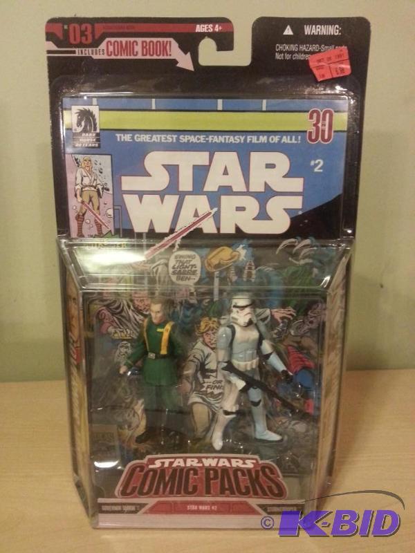 lot 75 image: Star Wars Comic Pack. Comes with Governor Tar...