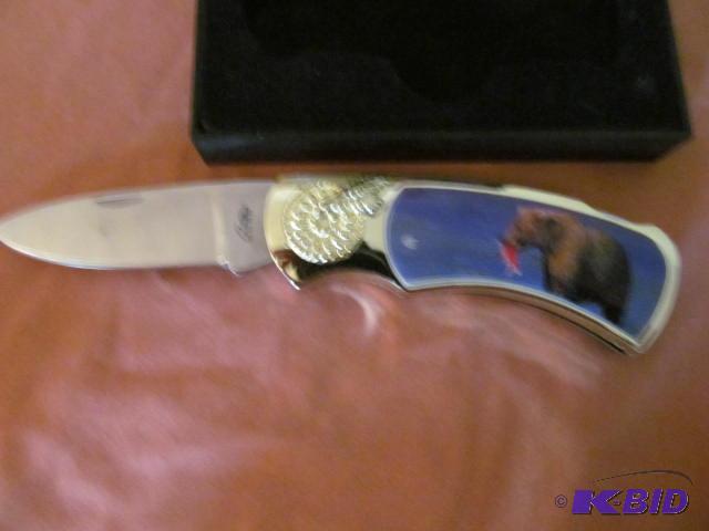 lot 16 image: Brand new in box, retractable pocket knife, p...