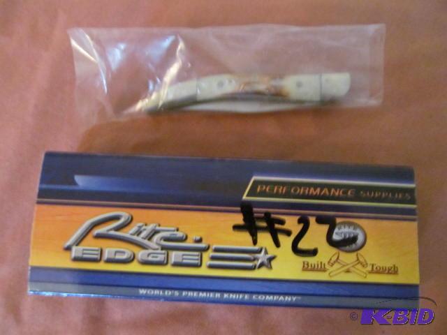 lot 22 image: Brand new in box, retractable pocket knife, R...