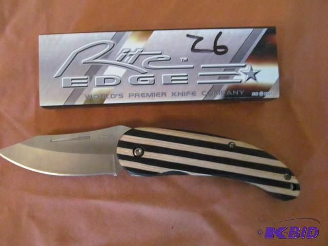 lot 26 image: Brand new in box, retractable pocket knife, R...