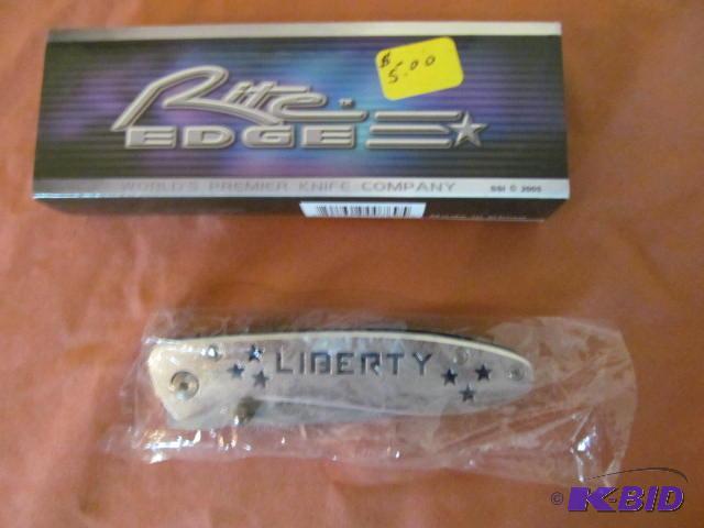 lot 29 image: Brand new in box, retractable pocket knife, R...