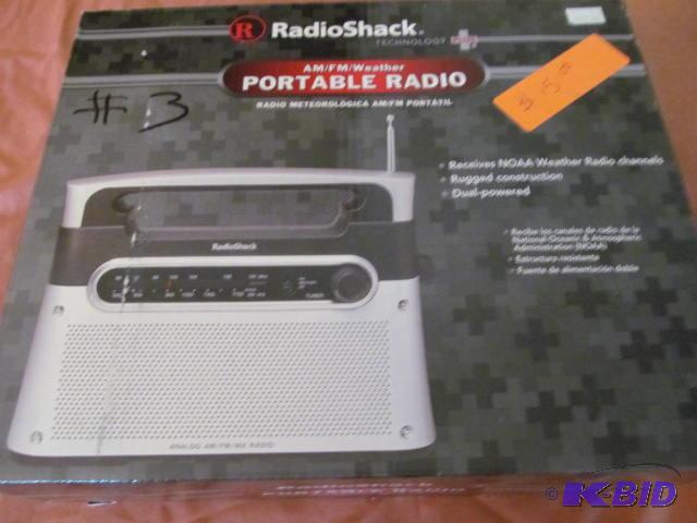 lot 3 image: Brand new in box, RadioShack portable radio, ...