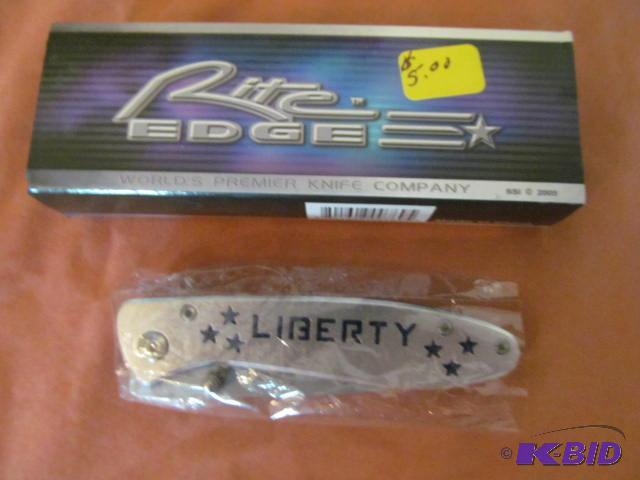 lot 30 image: Brand new in box, retractable pocket knife, R...