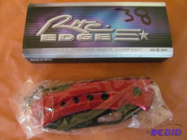 lot 38 image: Brand new in box, retractable pocket knife, R...