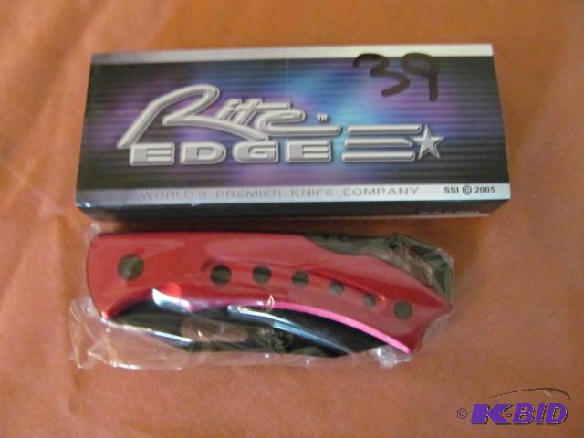 lot 39 image: Brand new in box, retractable pocket knife, R...