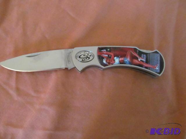 lot 43 image: Brand new in box, retractable pocket knife in...
