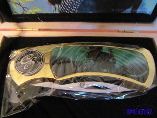 lot 58 image: Brand new in box, retractable pocket knife, r...