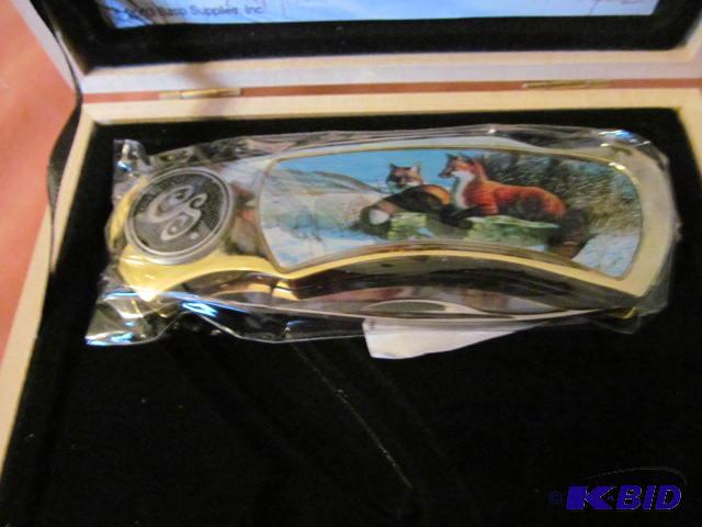 lot 60 image: Brand new in box, retractable pocket knife, r...