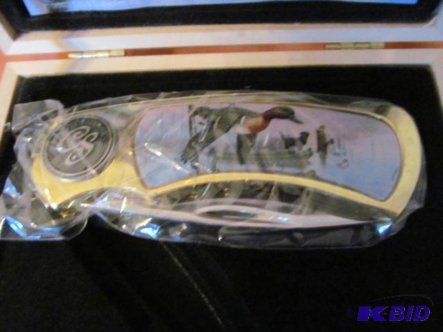 lot 61 image: Brand new in box, retractable pocket knife, r...
