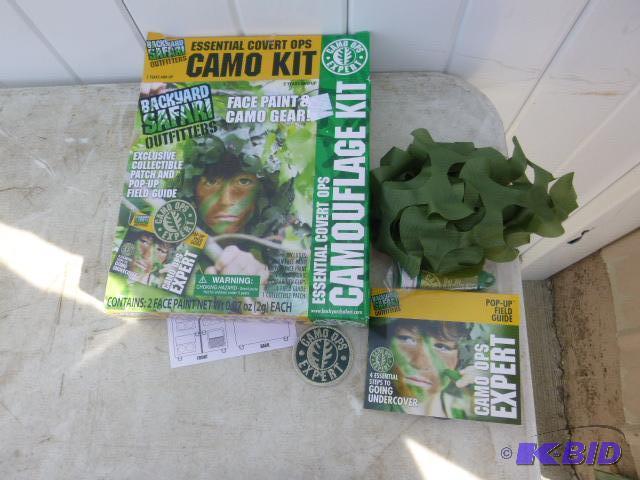 lot 74 image: Camouflage Kit Face paint and camo gear....