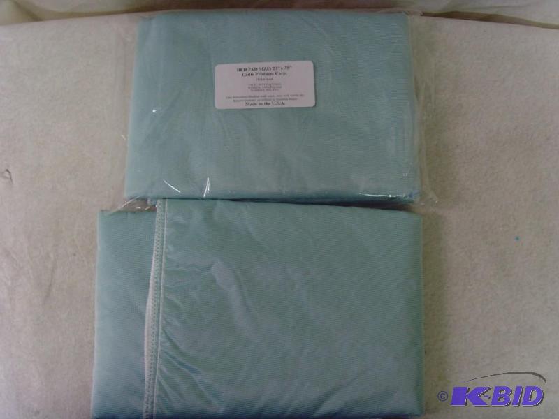 lot 124 image: 2 New Bed Pads
