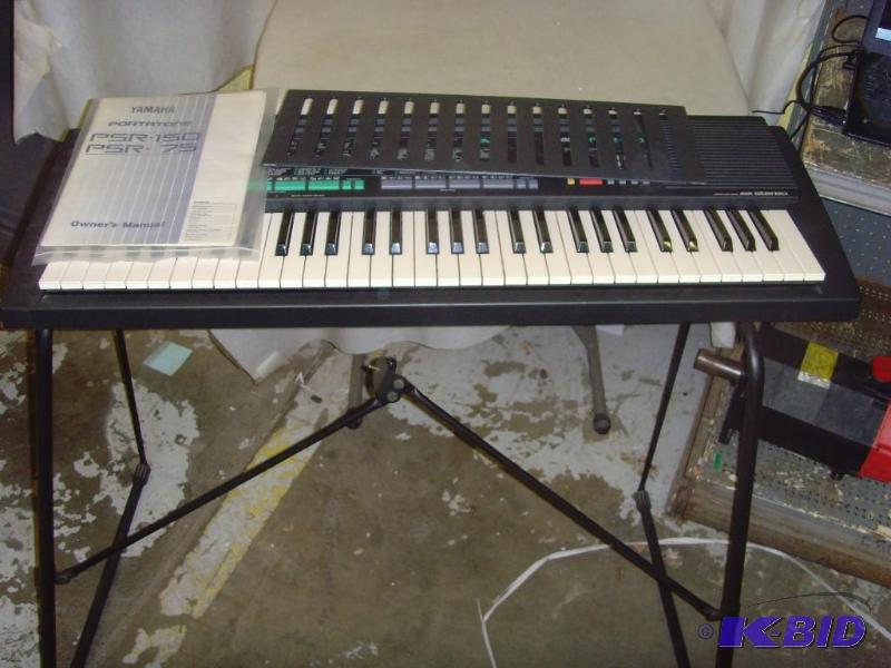 lot 147 image: Yamaha Portatone Keyboard